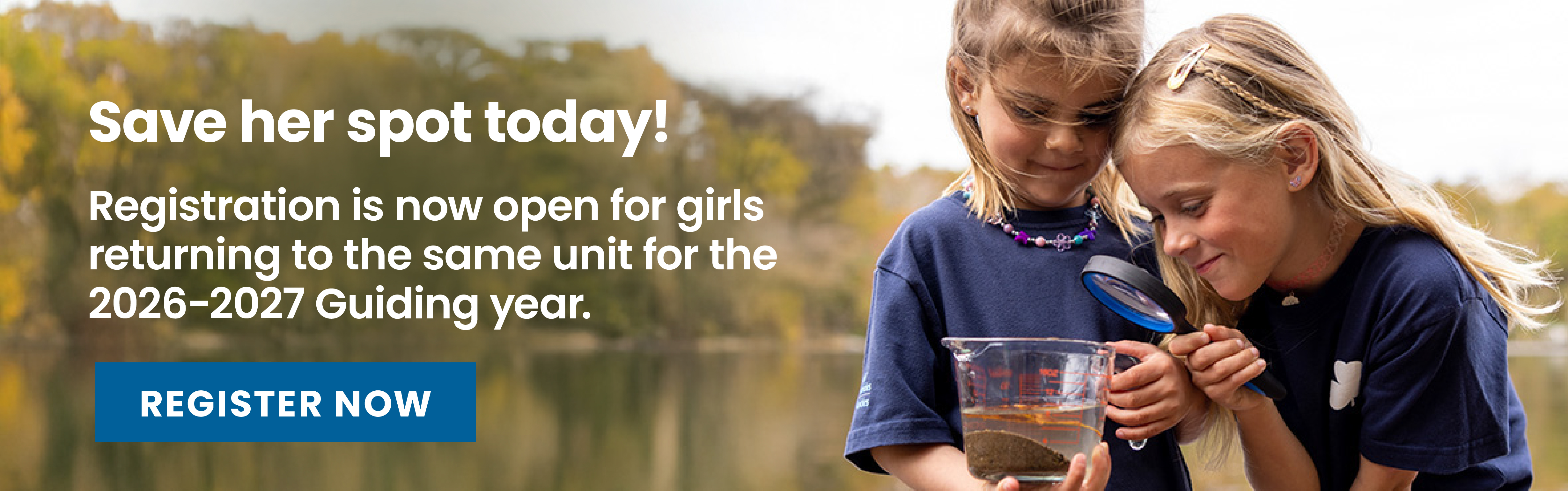 Two girls conducting a science experiment, holding a beaker and a magnifying glass
    